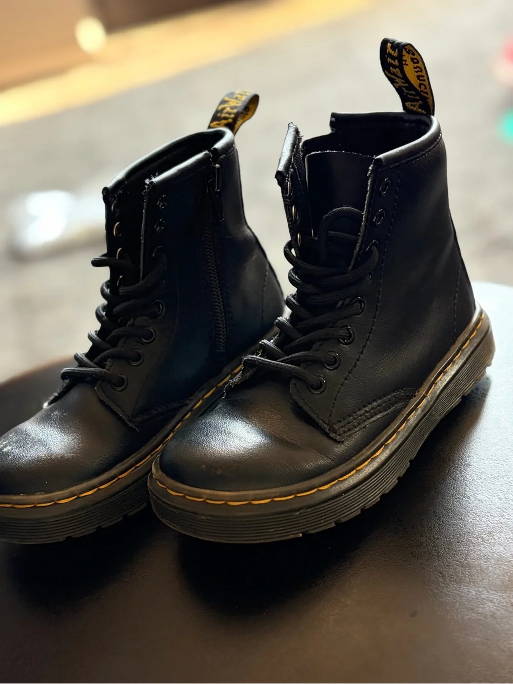 Dr. Martens Kids Black Leather Lace-Up Boots with Yellow Stitching